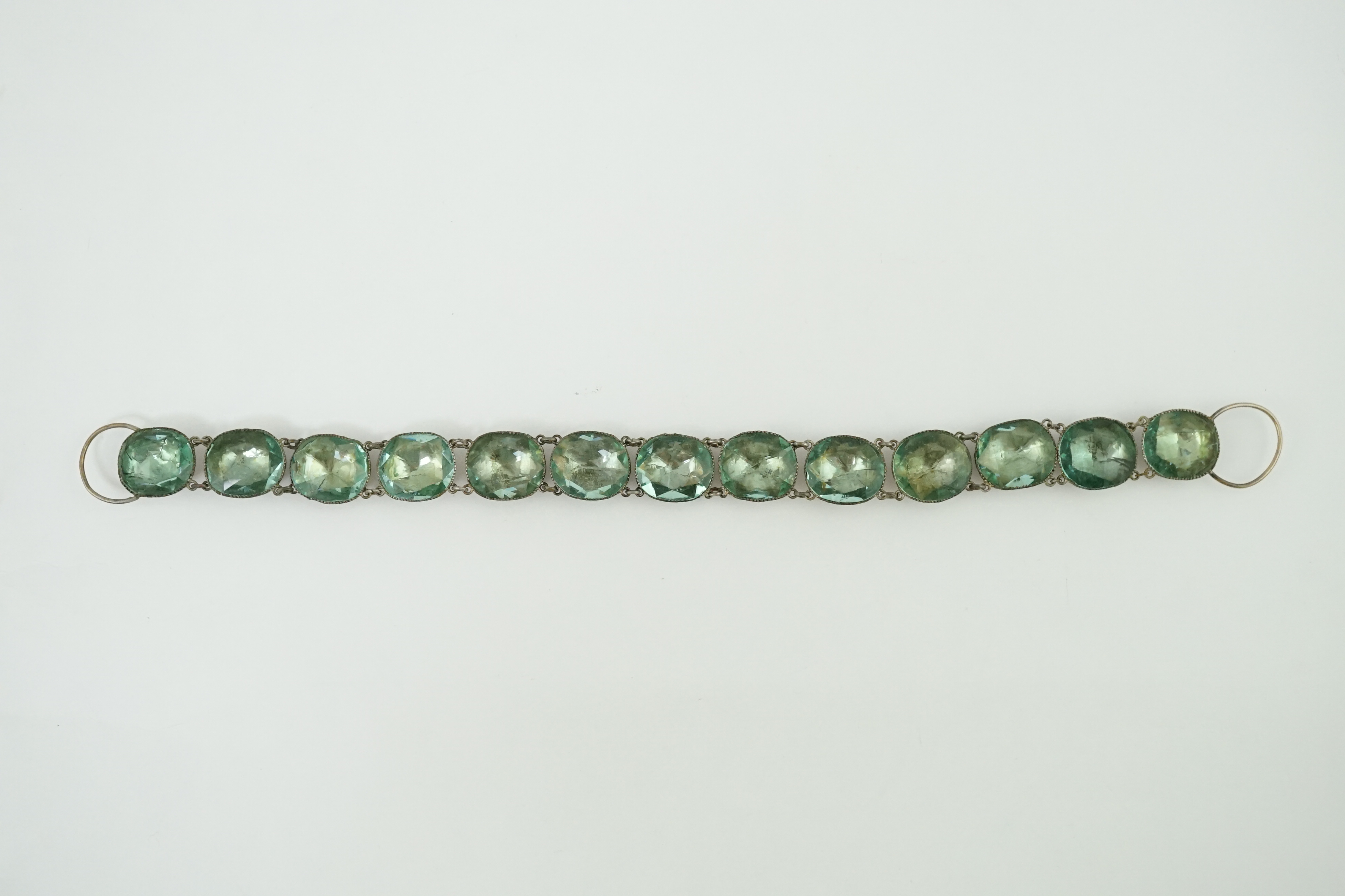 A rare 18th century 'Queen Anne' silvered metal and foil backed aquamarine paste necklace